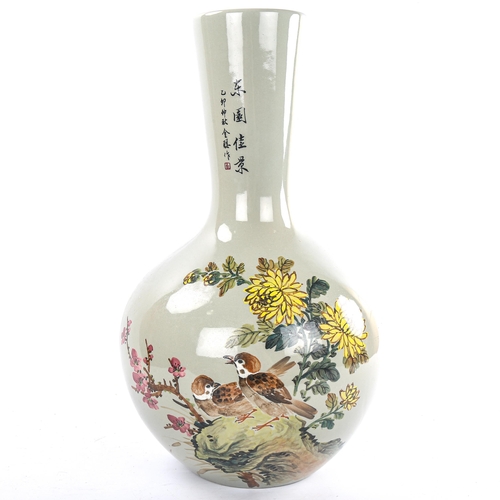 72 - A Chinese green glaze vase with painted birds and flowers, height 46cm, signed under base