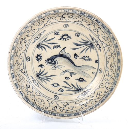 74 - A Chinese blue and white ceramic bowl, with hand painted fish design, diameter 34cm