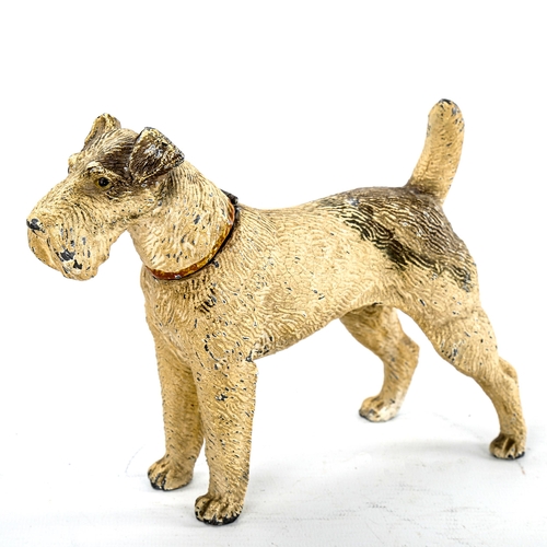 78 - A cold painted metal novelty lighter in the form of an Airedale Terrier, mid-20th century, length ap... 