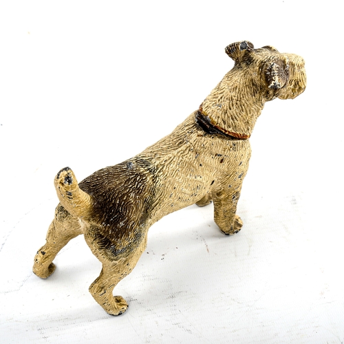 78 - A cold painted metal novelty lighter in the form of an Airedale Terrier, mid-20th century, length ap... 