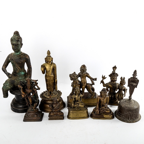 81 - A group of Antique Indian bronze deities, largest height 32cm (9)