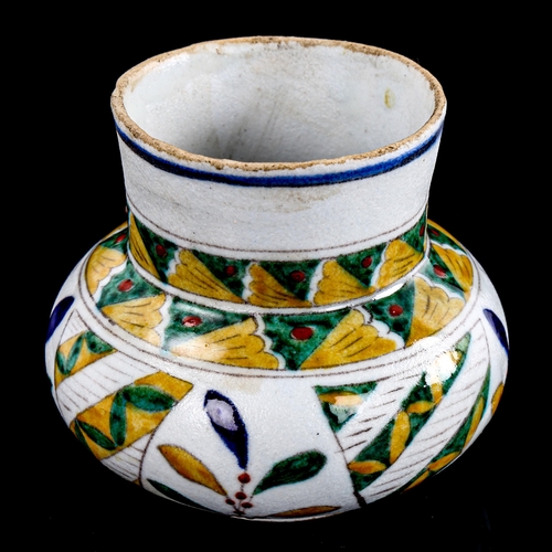 87 - A small Turkish pottery Kutahya vase, with painted decoration, height 8cm, rim diameter 7cm