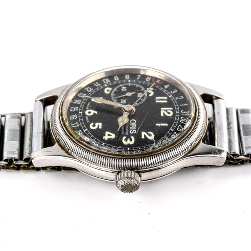 407 - ORIS - a Vintage stainless steel Pointer Date automatic bracelet watch, ref. 2462, black dial with l... 