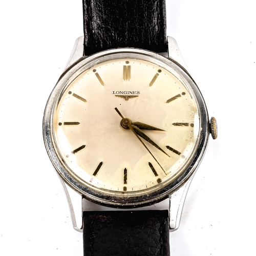 408 - LONGINES - a Vintage stainless steel mechanical wristwatch, ref. 6995-1, circa 1960s, silvered dial ... 