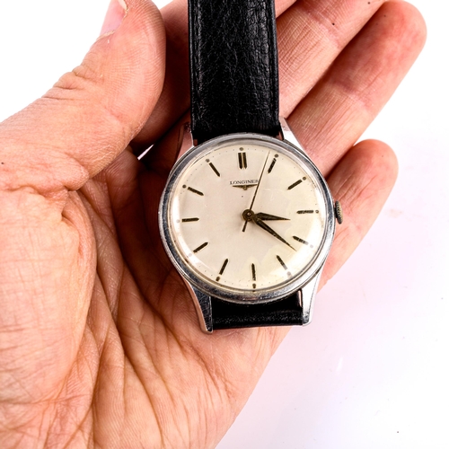 408 - LONGINES - a Vintage stainless steel mechanical wristwatch, ref. 6995-1, circa 1960s, silvered dial ... 