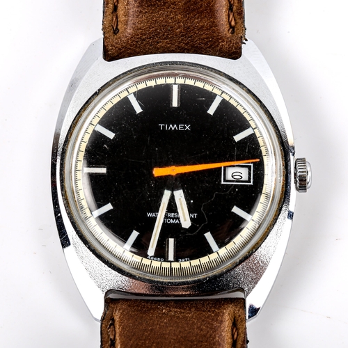 421 - TIMEX - a Vintage stainless steel automatic wristwatch, black dial with white baton hour markers, lu... 