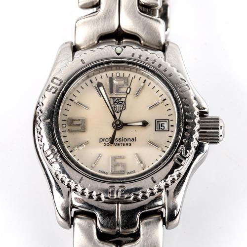 426 - TAG HEUER - a lady's stainless steel Professional 200M quartz bracelet watch, ref. WT141A, mother-of... 