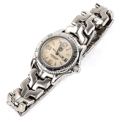 426 - TAG HEUER - a lady's stainless steel Professional 200M quartz bracelet watch, ref. WT141A, mother-of... 