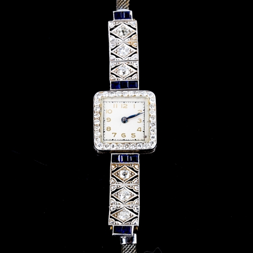 427 - A lady's Art Deco sapphire and diamond cocktail wristwatch, set with calibre cut sapphires and old a... 