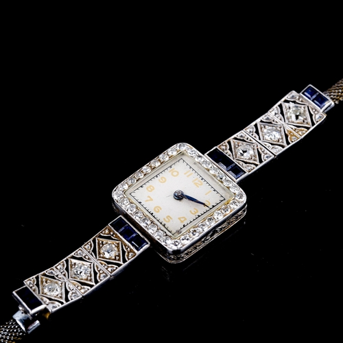 427 - A lady's Art Deco sapphire and diamond cocktail wristwatch, set with calibre cut sapphires and old a... 