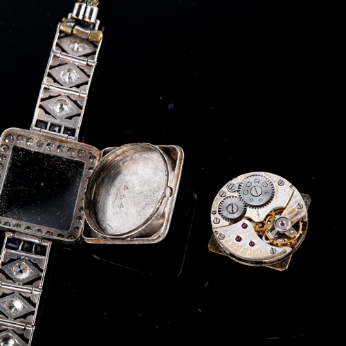 427 - A lady's Art Deco sapphire and diamond cocktail wristwatch, set with calibre cut sapphires and old a... 