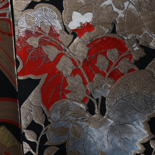 63 - A Japanese wedding kimono, red silk ground with gold and silver embroidered wirework decoration, tog... 