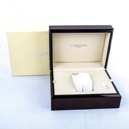 446 - LONGINES - a modern casket watch box and outer box