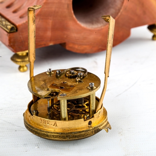 460 - An early 20th century French red marble-cased mantel clock, surmounted by gilt-bronze cherub, overal... 