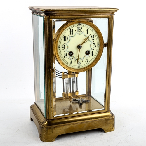 462 - An early 20th century French brass-cased 4-glass 8-day mantel clock, cream enamel dial with Arabic n... 