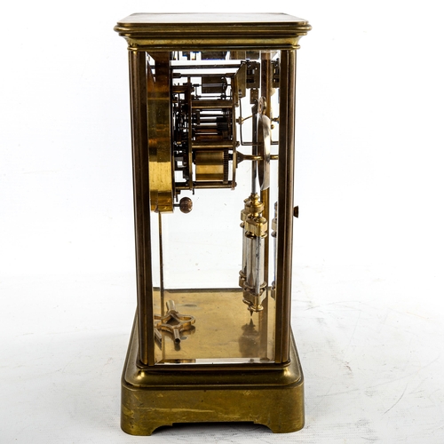 463 - An early 20th century brass-cased 4-glass 8-day mantel clock, by Payne & Co of London, white enamel ... 