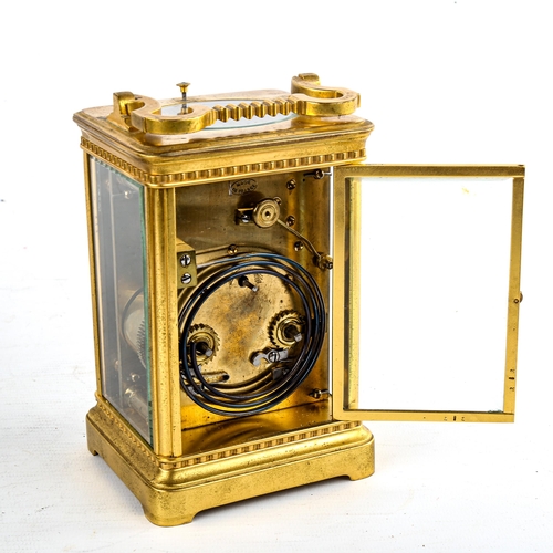 450 - A large French brass-cased repeater carriage clock, white enamel dial with Arabic numerals, blued st... 