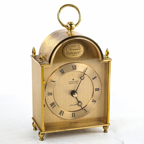 454 - JUNGHANS - a Vintage German brass-cased electronic ato-mat (carriage clock), gilded dial with Roman ... 