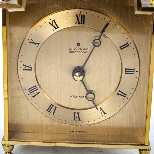 454 - JUNGHANS - a Vintage German brass-cased electronic ato-mat (carriage clock), gilded dial with Roman ... 