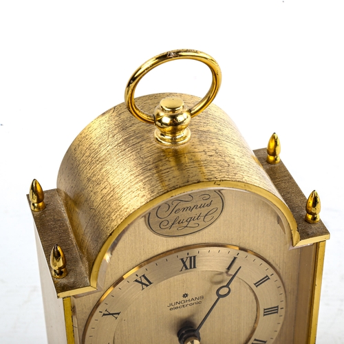 454 - JUNGHANS - a Vintage German brass-cased electronic ato-mat (carriage clock), gilded dial with Roman ... 