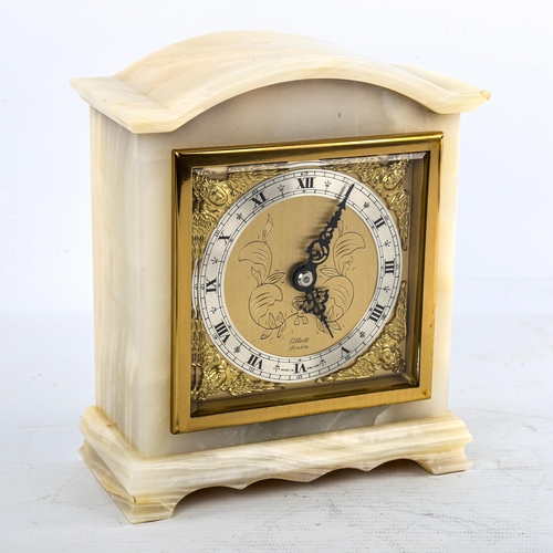 455 - A Vintage polished onyx dome-top mantel clock, by Elliott of London, gilt dial with silvered chapter... 