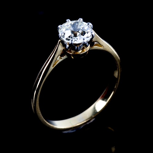 501 - An 18ct gold 0.85ct solitaire diamond ring, set with unmarked plain claw setting with old European-c... 