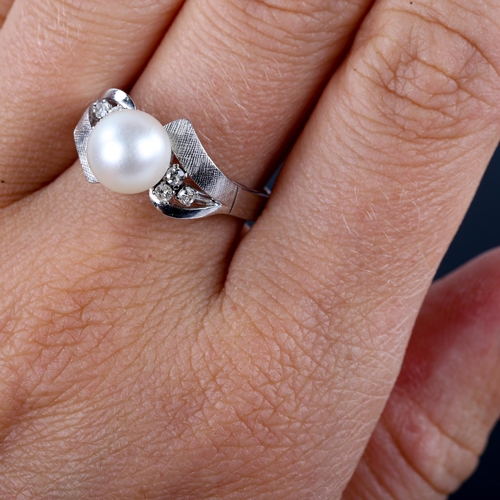 520 - A late 20th century 14ct white gold whole cultured pearl and diamond dress ring, possibly Mikimoto, ... 