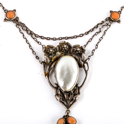 542 - A Continental Arts and Crafts unmarked silver coral and blister pearl lavaliere pendant necklace, op... 