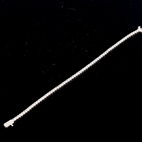 543 - A modern sterling silver diamond tennis line bracelet, illusion set with single-cut diamonds, total ... 