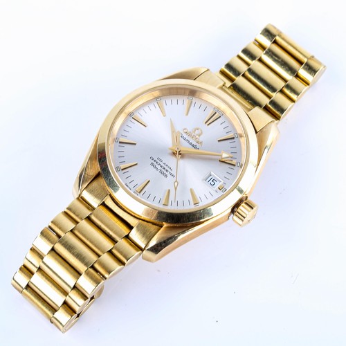 401 - OMEGA - an 18ct gold Seamaster Aqua Terra Co-Axial automatic chronometer bracelet watch, ref. 2104.3... 