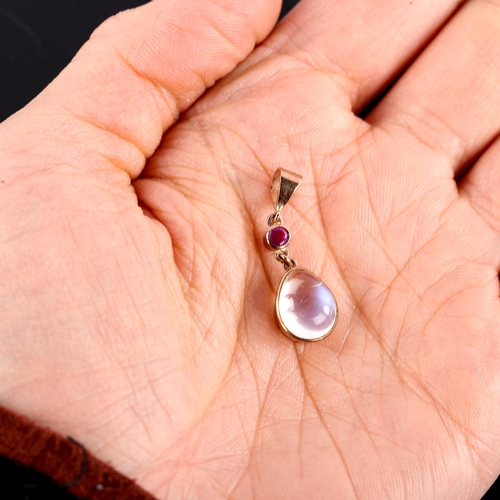 558 - A modern 9ct gold moonstone and ruby drop pendant, set with pear cabochon moonstone and round-cut ru... 