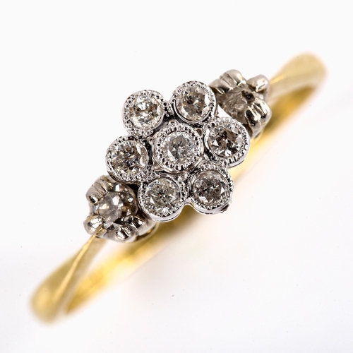 561 - A mid-20th century 18ct gold diamond cluster flowerhead ring, set with round brilliant and old-cut d... 