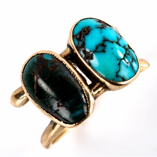 564 - A Continental unmarked gold double-turquoise crossover ring, set with oval cabochon turquoise matrix... 