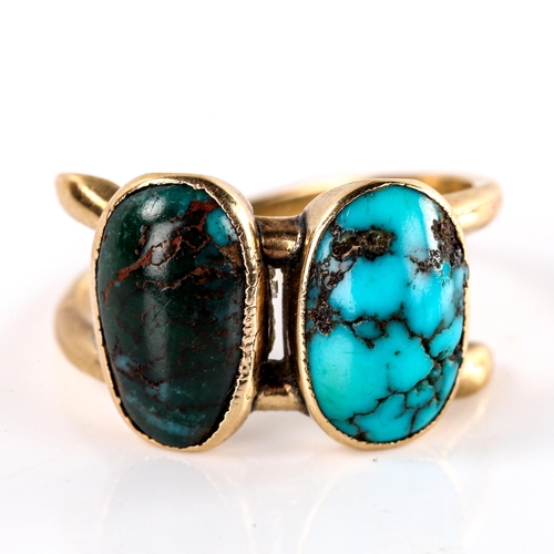 564 - A Continental unmarked gold double-turquoise crossover ring, set with oval cabochon turquoise matrix... 