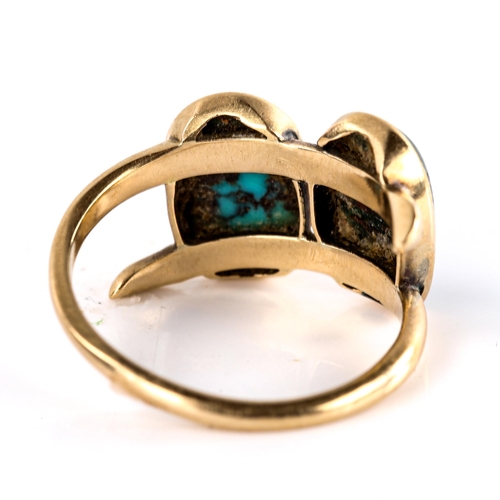 564 - A Continental unmarked gold double-turquoise crossover ring, set with oval cabochon turquoise matrix... 