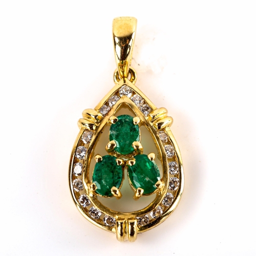 565 - A modern 18ct gold emerald and diamond pear cluster pendant, set with oval mixed-cut emeralds and ro... 