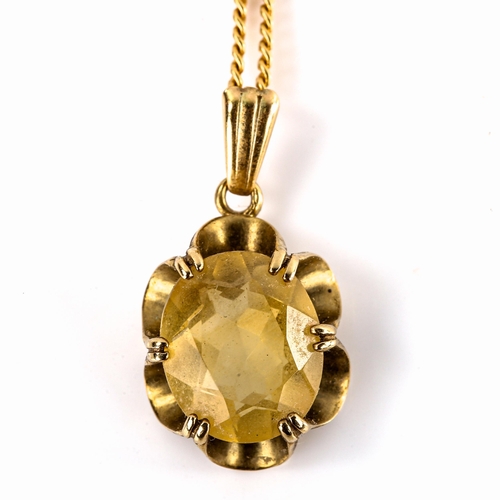 574 - A late 20th century 9ct gold citrine pendant necklace, set with oval mixed-cut citrine on fine 18ct ... 