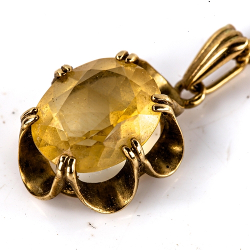 574 - A late 20th century 9ct gold citrine pendant necklace, set with oval mixed-cut citrine on fine 18ct ... 