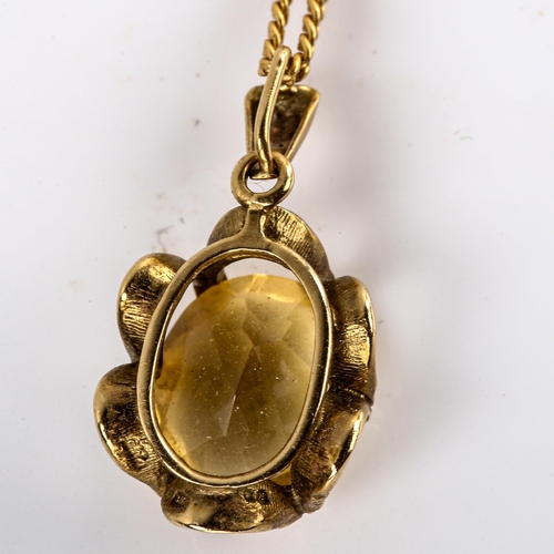 574 - A late 20th century 9ct gold citrine pendant necklace, set with oval mixed-cut citrine on fine 18ct ... 