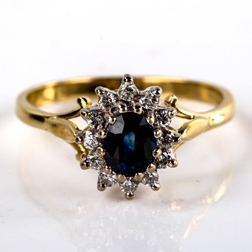 577 - A late 20th century 18ct gold sapphire and diamond cluster ring, set with oval mixed-cut sapphire an... 