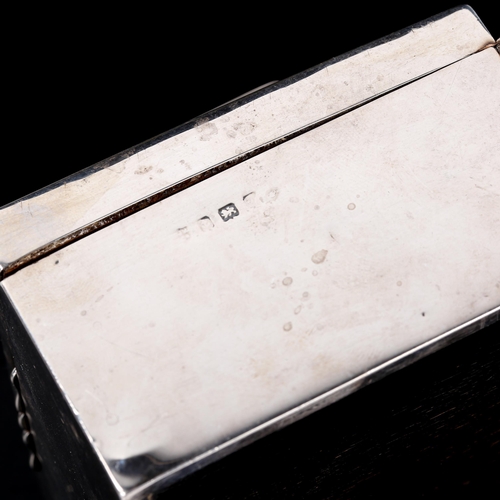 583 - A George V rectangular silver combination cigarette/Vesta box, indistinct maker's marks, hallmarks B... 