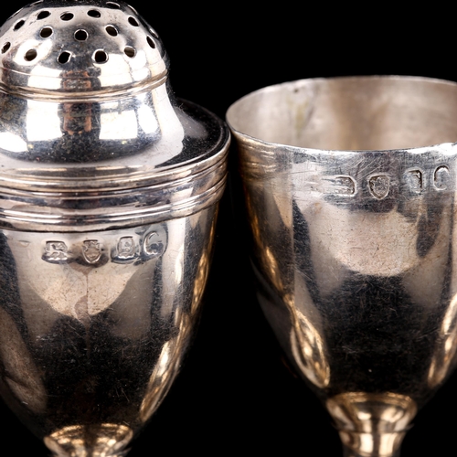 584 - A pair of George III silver baluster pepperettes, indistinct maker's marks, hallmarks London 1797/17... 