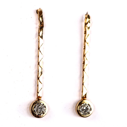 585 - A pair of unmarked gold solitaire diamond drop pendant earrings, set with single-cut diamonds, earri... 