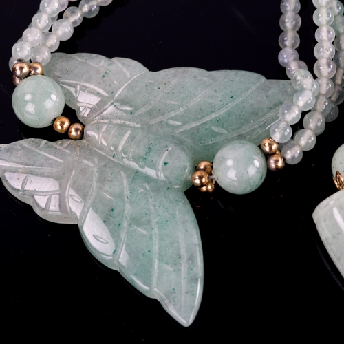 599 - 2 polished jade bead necklaces, largest length 74cm, 174.7g total (2)