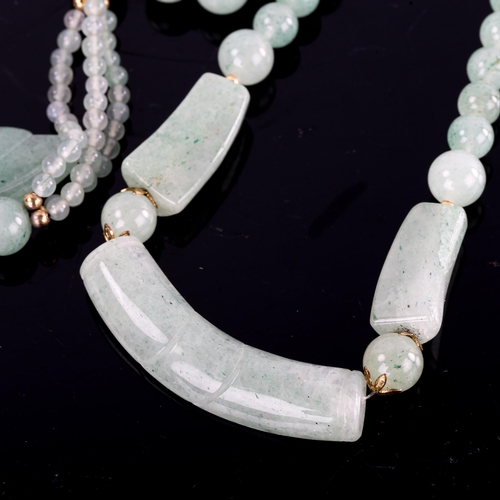 599 - 2 polished jade bead necklaces, largest length 74cm, 174.7g total (2)