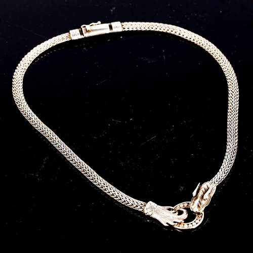 600 - A heavy modern sterling silver figural dragon chain necklace, necklace length 45cm, 61.6g