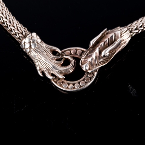 600 - A heavy modern sterling silver figural dragon chain necklace, necklace length 45cm, 61.6g