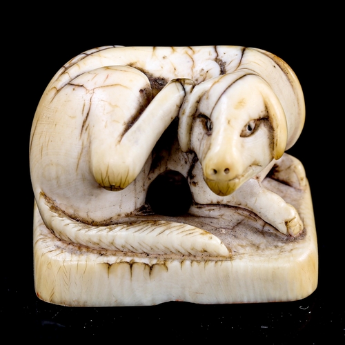 214 - A Japanese ivory seal in the form of an animal, 19th century, length 3.5cm, height 3cm