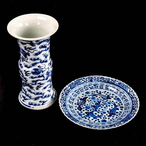 217 - A Chinese blue and white porcelain sleeve vase, 4 character mark, height 15cm, and a blue and white ... 