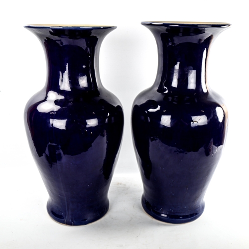 224 - A large pair of cobalt blue ceramic vases, no marks, height 52cm